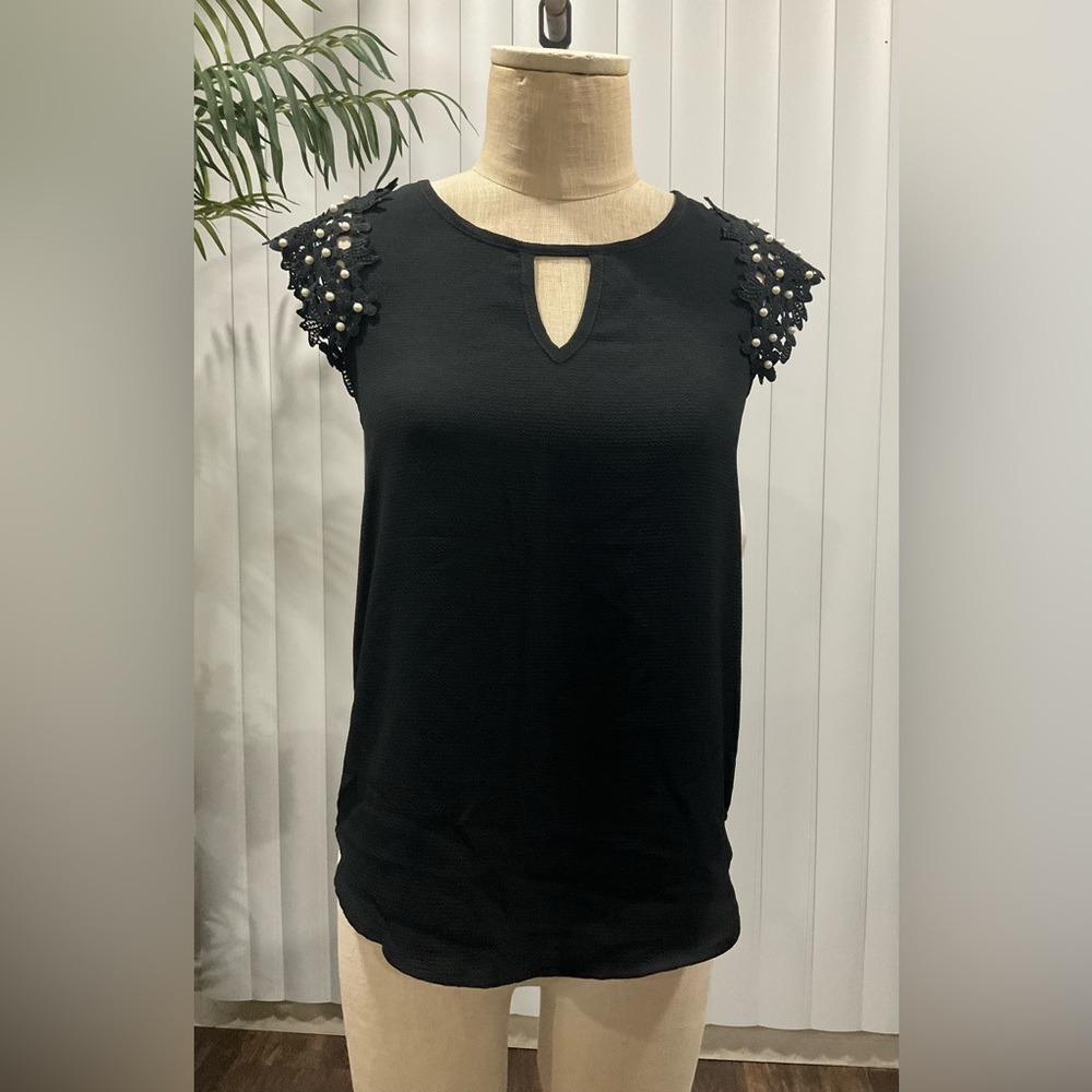 Black blouse with pearls on sleeves